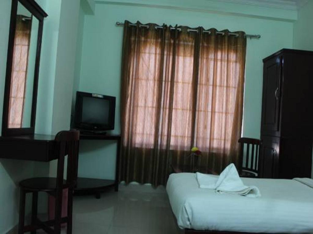 Sm Regency Kochi Room photo